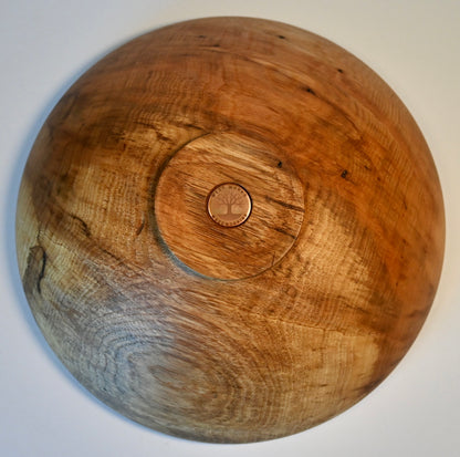 Hand-turned hickory bowl with natural wood grain, 12 inches wide