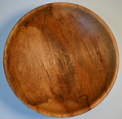 Hand-turned hickory bowl with natural wood grain, 12 inches wide